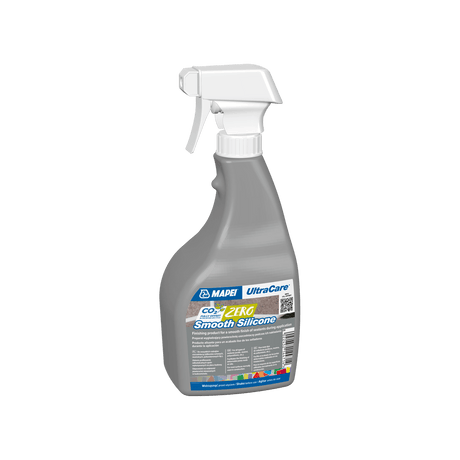 A spray bottle of UltraCare CO2 Zero Smooth Silicone sealant on a black background.