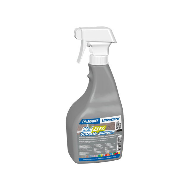 A spray bottle of UltraCare CO2 Zero Smooth Silicone sealant on a black background.