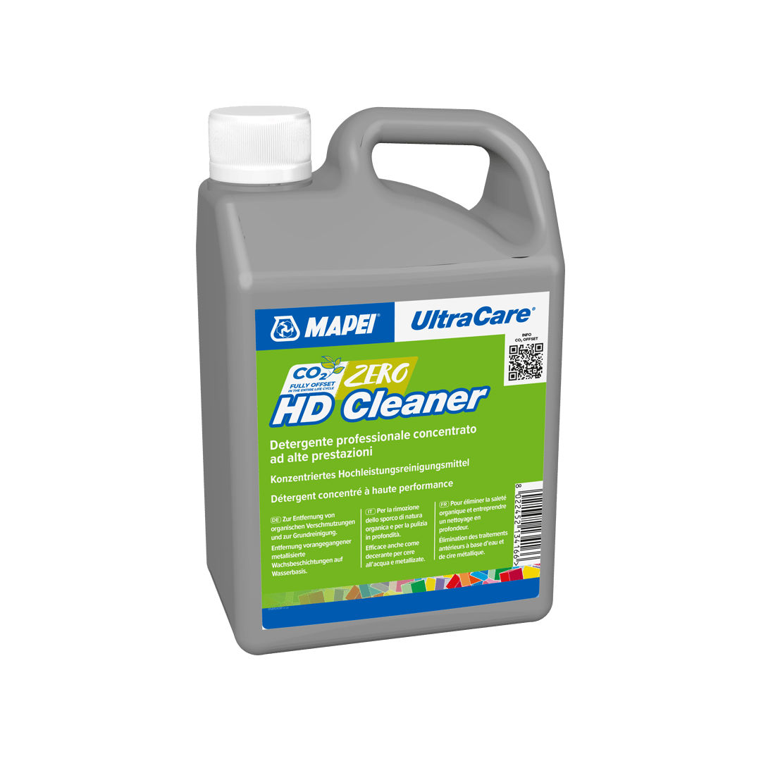 A plastic jug of MAPEI UltraCare Zero HD Cleaner with labels in multiple languages.