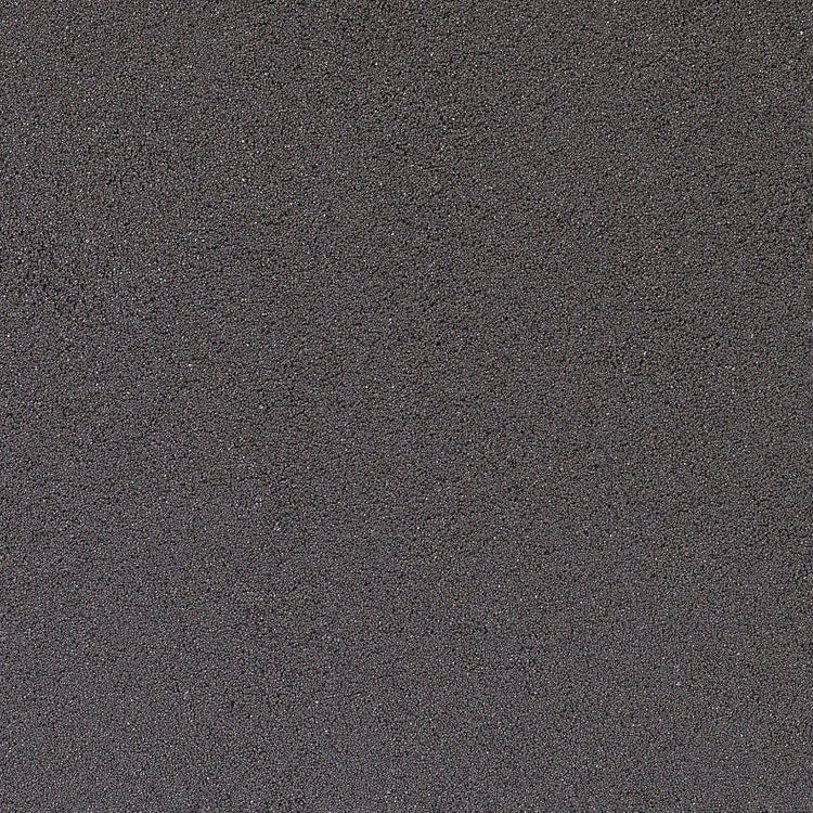 A container of EASYJoint Select Carbon paving joint compound with a color sample.