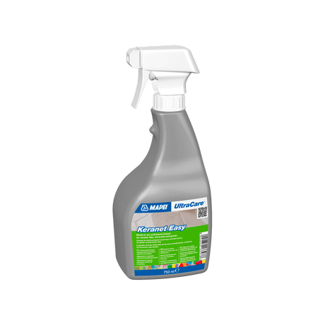 Spray bottle of MAPEI UltraCare KeraNet Easy cleaner on a dark background.