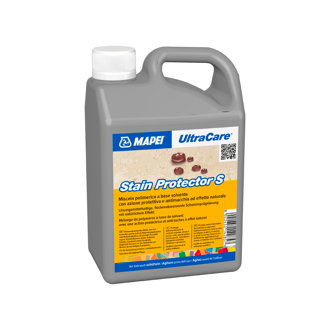 A plastic jug of MAPEI UltraCare Stain Protector S with product details on the label.