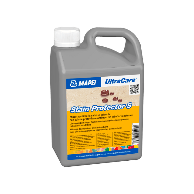 A plastic jug of MAPEI UltraCare Stain Protector S with product details on the label.