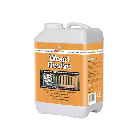 Plastic jug of 'Wood Revive' cleaner for restoring hard and soft wood surfaces.