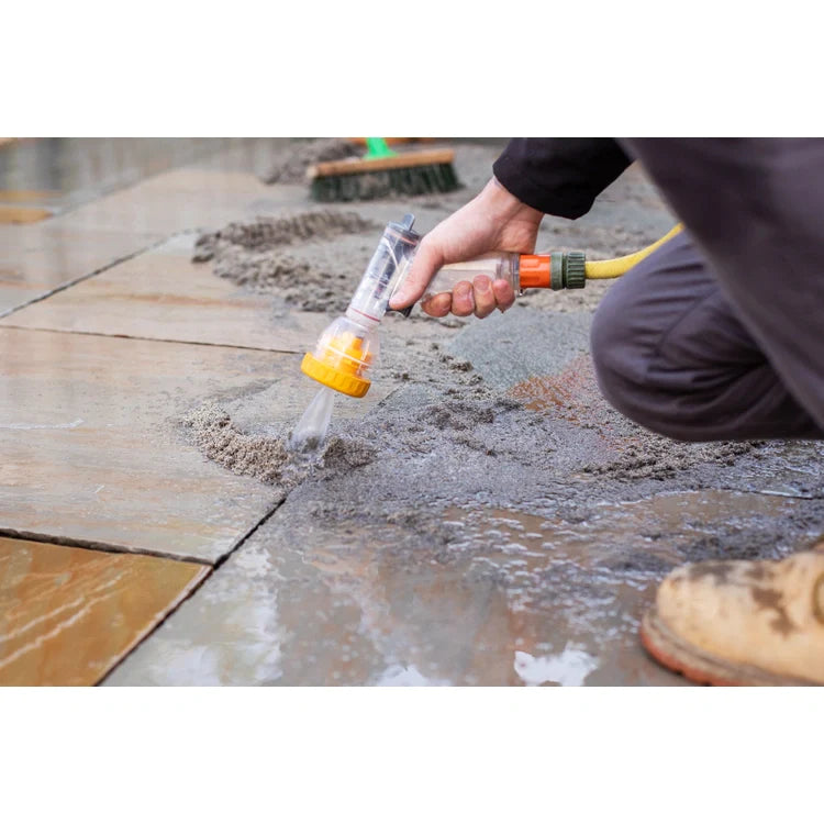 Container of EASYJoint all-weather paving joint compound by Azpects with a close-up of the granular material.