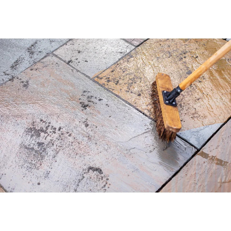 Container of EASYJoint all-weather paving joint compound with a close-up of the texture.