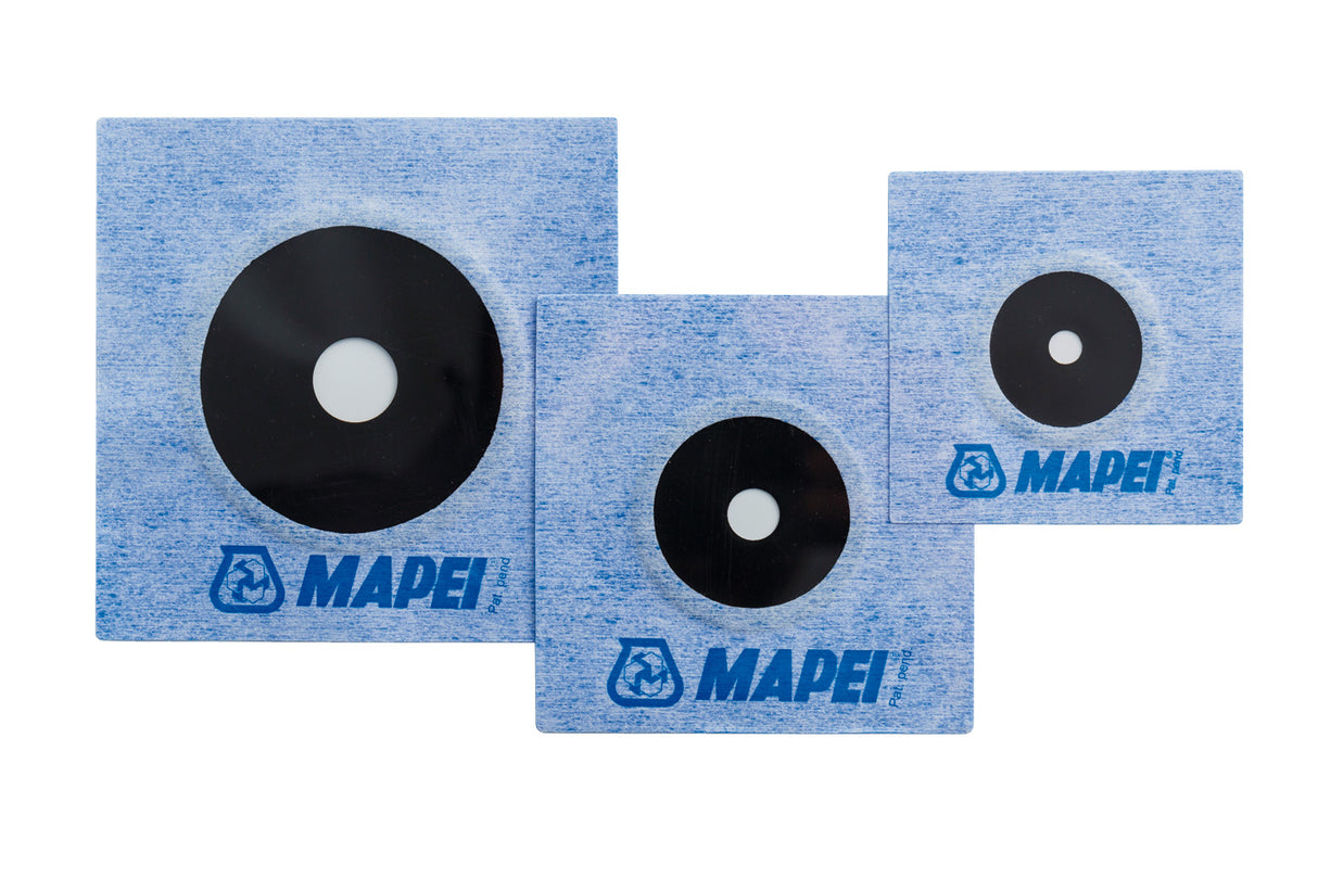 Three blue Mapei leveling spacers with black circular centers and white dots.