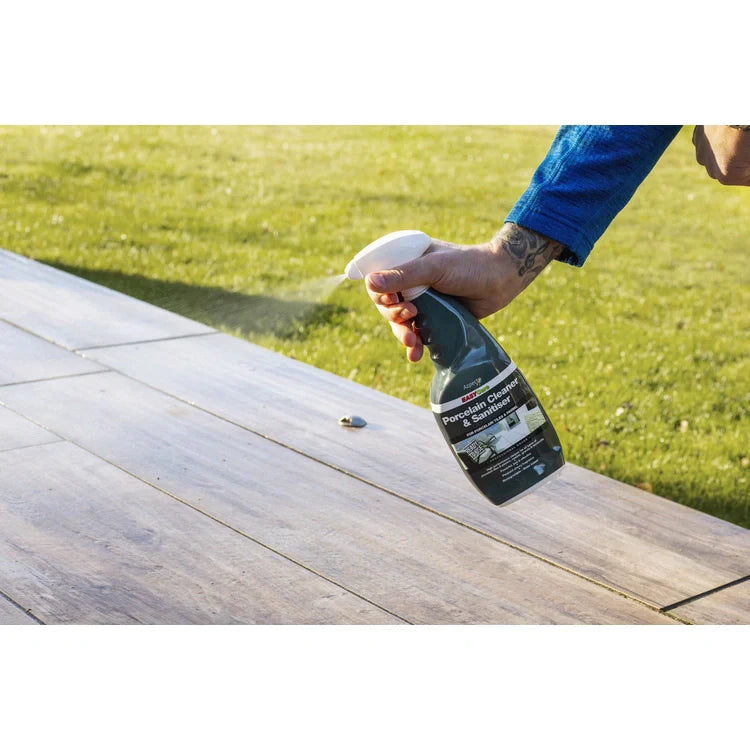 Bottle of porcelain cleaner and sanitiser for tiles and paving.